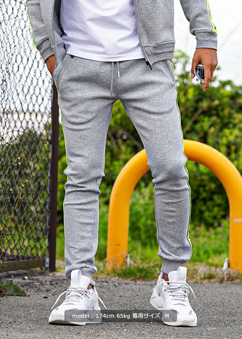 RTEG/ネオンテープジップスウェットパンツ | adamsJUGGLER（アダムス