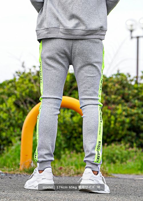RTEG/ネオンテープジップスウェットパンツ | adamsJUGGLER（アダムス