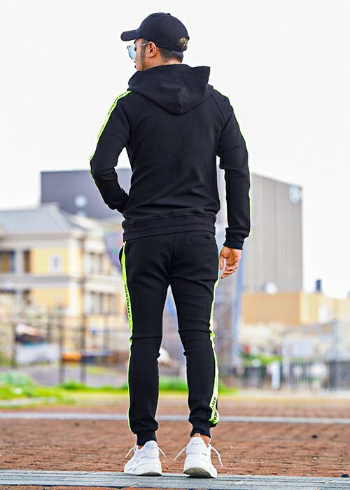 RTEG/ネオンテープジップスウェットパンツ | adamsJUGGLER（アダムス