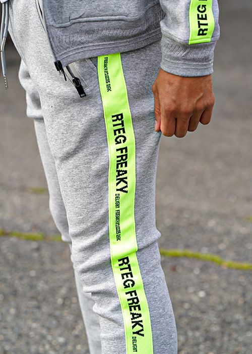 RTEG/ネオンテープジップスウェットパンツ | adamsJUGGLER（アダムス